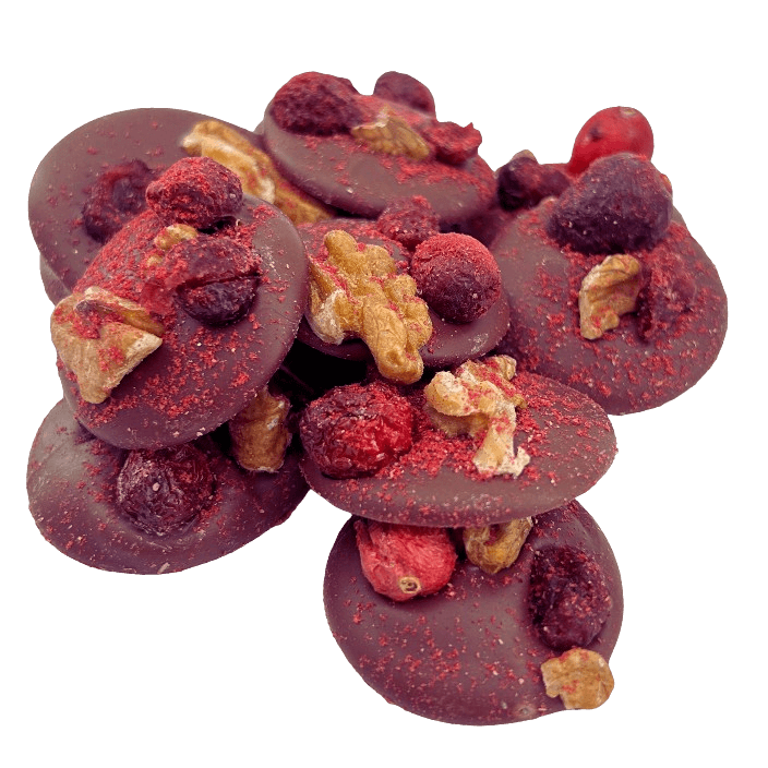 Vollmilchschokolade mit Walnüssen, Preiselbeeren, schwarzen Johannisbeeren und Himbeerstückchen