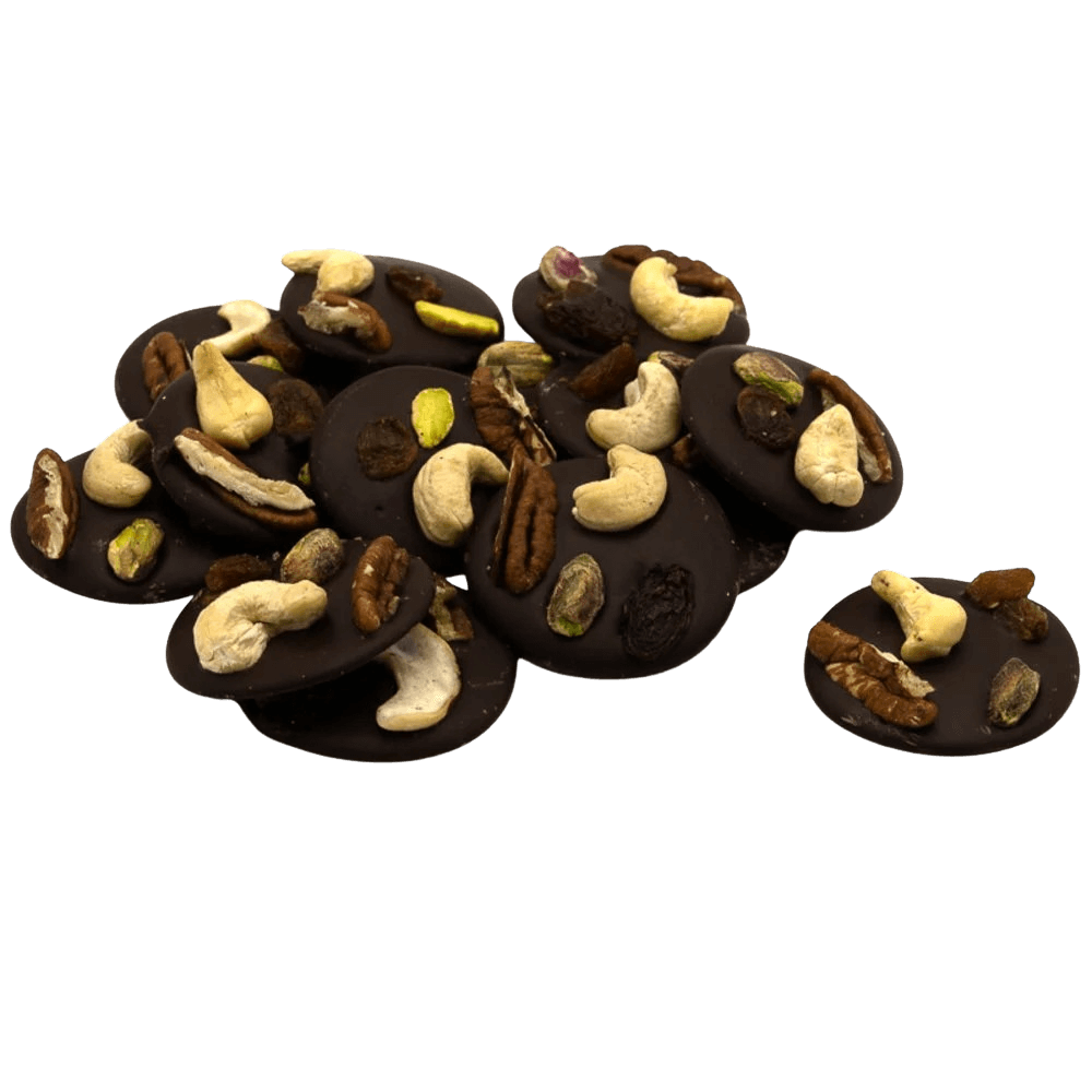 Zartbitterschokoladen-Mendiants mit Cashew-, Pistazien-, Rosinen- und Pekannussstückchen