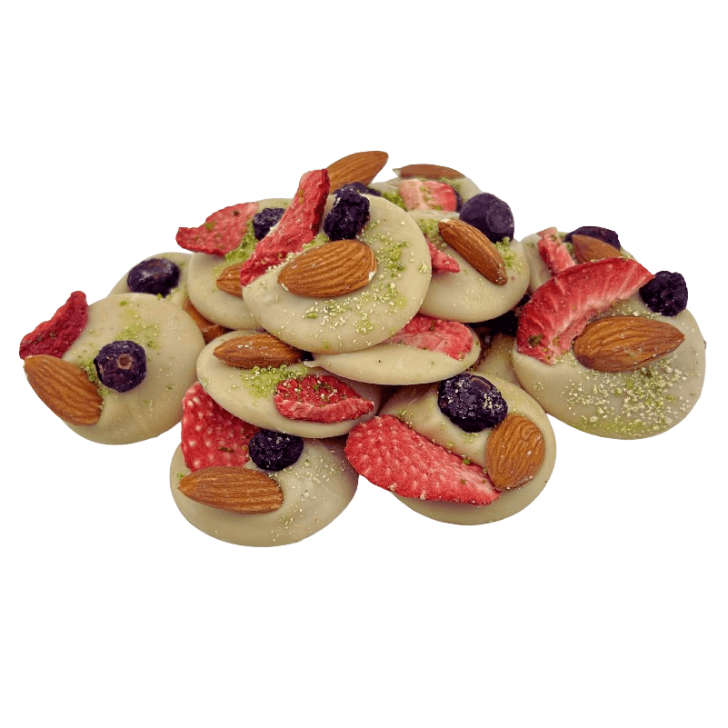 White chocolate mendiants with pistachio, almond, strawberry and blackcurrant chunks 5407008474454 The Belgian Chocolate Makers